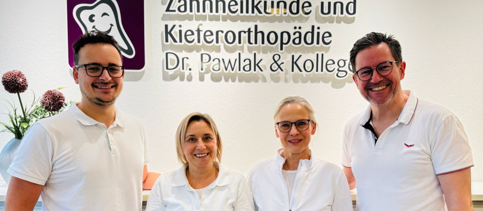 Die Zahnärzte der Praxis Dr. Pawlak: Dr. Marco Lubrich, Dr. Karin Ropte, Dr. Christiane Neuhaus-Pawlak und Dr. Frank Pawlak